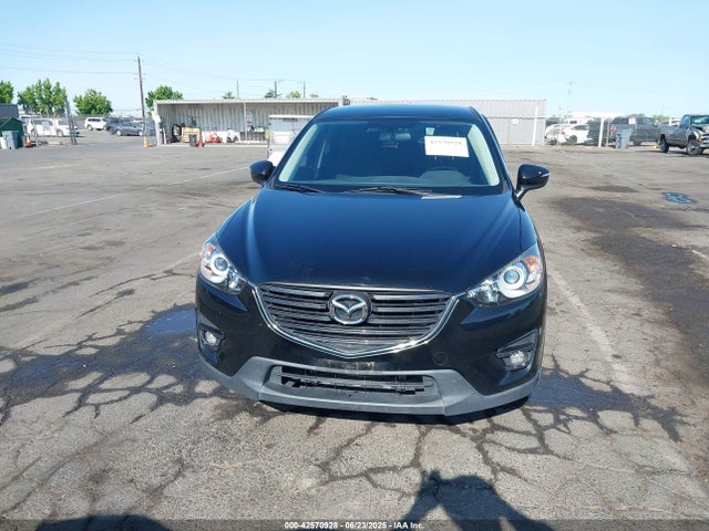 JM3KE2CY6G0911717 Mazda py