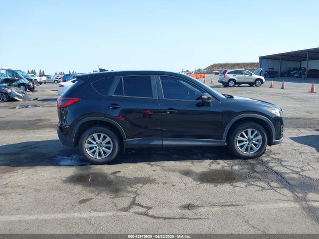 JM3KE2CY6G0911717 Mazda py