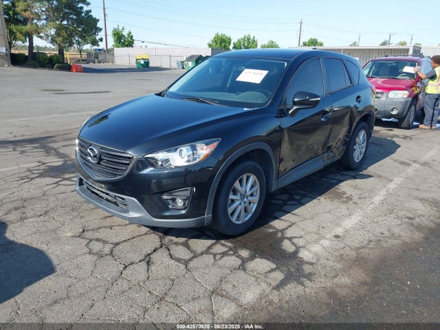 JM3KE2CY6G0911717 Mazda py