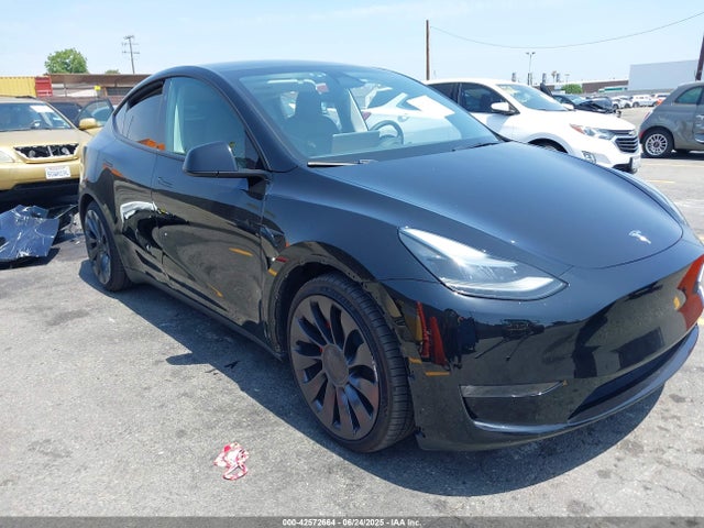 2024 TESLA MODEL Y 7SAYGDEF7RF058563 Photo 0