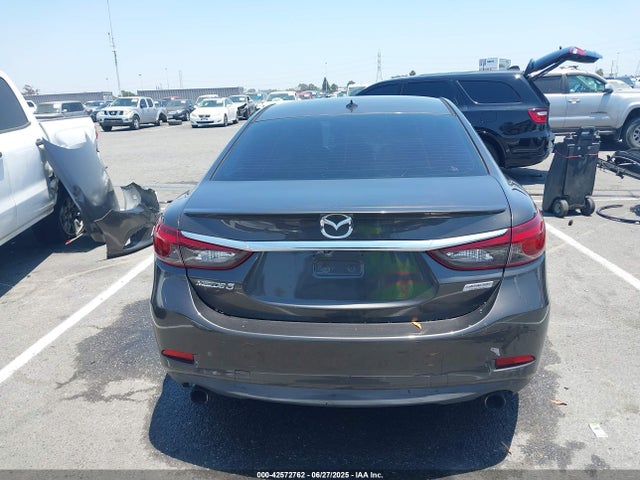 JM1GJ1W54G1471366 Mazda py