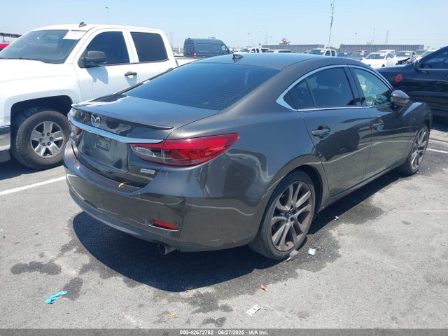 JM1GJ1W54G1471366 Mazda py