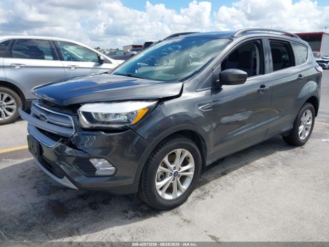 2018 FORD ESCAPE 1FMCU9GD1JUC06528 Photo 1