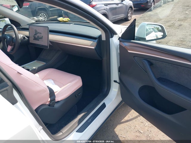 2023 TESLA MODEL Y 7SAYGAEE5PF799765 Photo 4