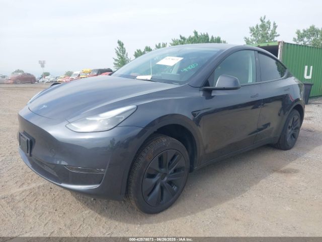 2025 TESLA MODEL Y 7SAYGDEE1SA369027 Photo 1