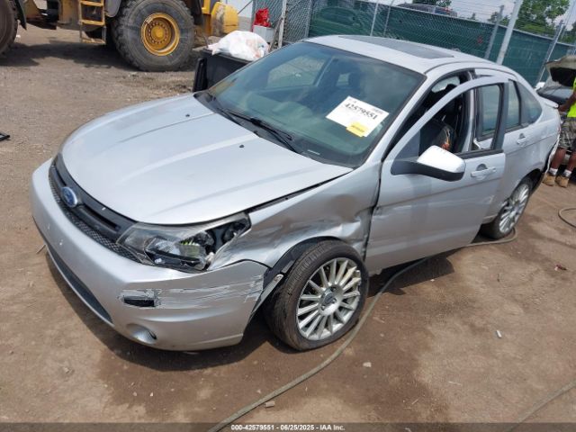 2010 FORD FOCUS 1FAHP3GN5AW124478 Photo 1