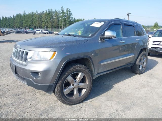 2013 JEEP GRAND CHEROKEE 1C4RJFCTXDC524032 Photo 1