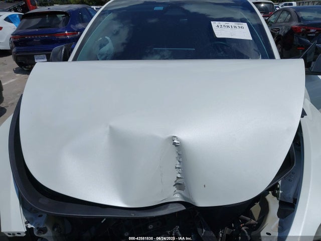 2023 TESLA MODEL Y 7SAYGAEE6PF969390 Photo 9