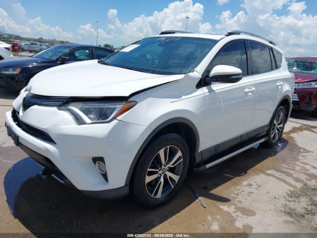 2017 TOYOTA RAV4 JTMWFREV9HJ703359 Photo 1