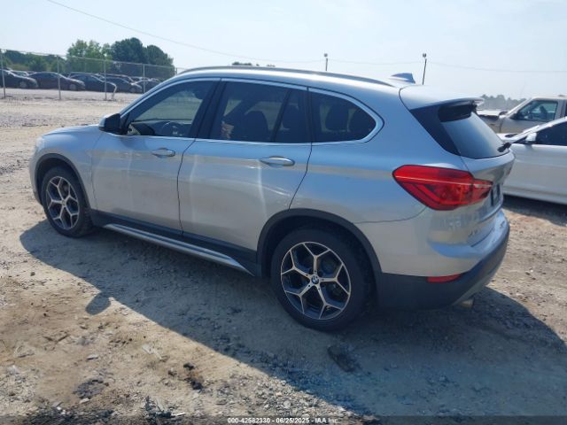 2018 BMW X1 WBXHT3C39J5L27926 Photo 2