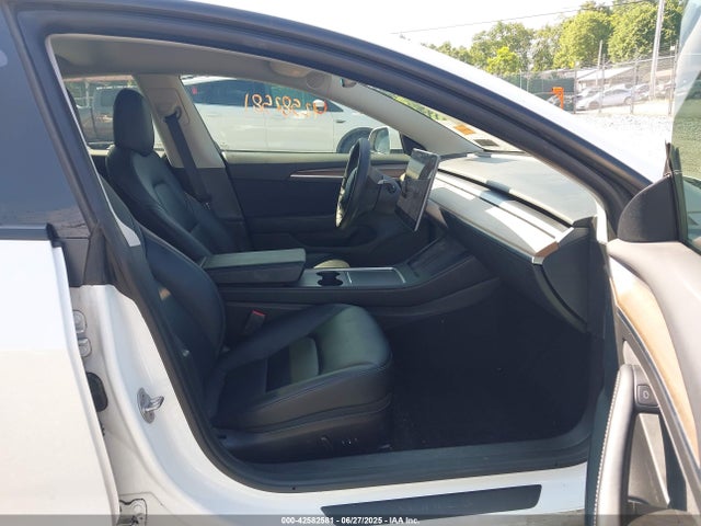 2021 TESLA MODEL 3 5YJ3E1EC4MF094253 Photo 4