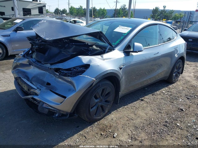 2025 TESLA MODEL Y 7SAYGDEE4SF281303 Photo 1