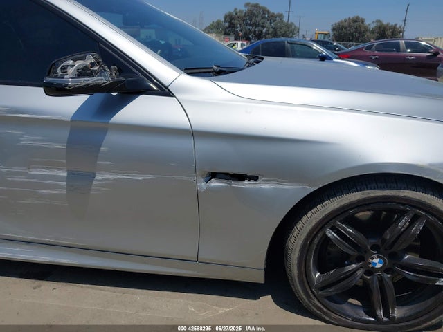 WBAKN9C52GD962015 BMW 2016
