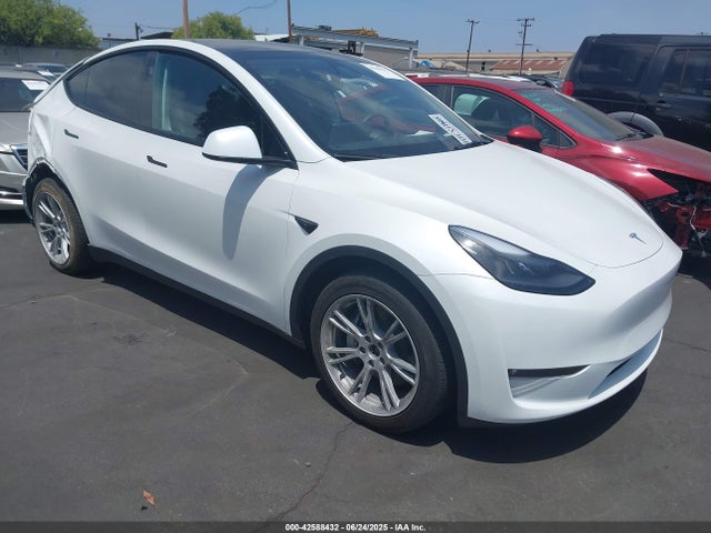 2024 TESLA MODEL Y 7SAYGDEE7RF063236 Photo 0