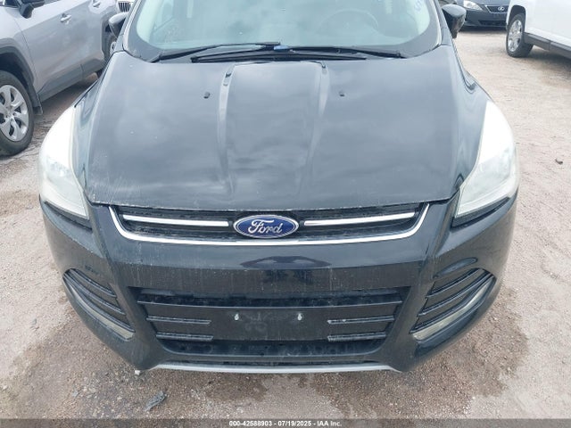 1FMCU0JXXEUA21754 Ford 2014