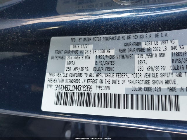 Mazda py 2021 3MVDMBDL0MM316358 Image 9