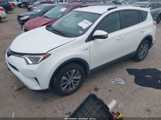 2018 TOYOTA RAV4 HYBRID JTMRJREV1JD233795 Photo 1