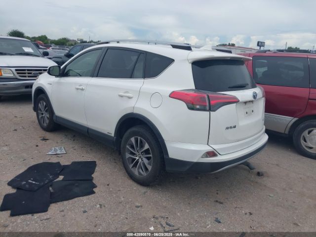 2018 TOYOTA RAV4 HYBRID JTMRJREV1JD233795 Photo 2