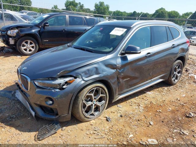 2016 BMW X1 WBXHT3C31G5E47828 Photo 1