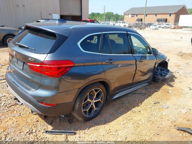 2016 BMW X1 WBXHT3C31G5E47828 Photo 3