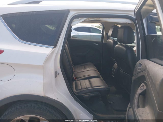 1FMCU0JX5EUA61904 Ford 2014