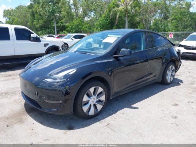 2023 TESLA MODEL Y 7SAYGAEE9PF931216 Photo 1