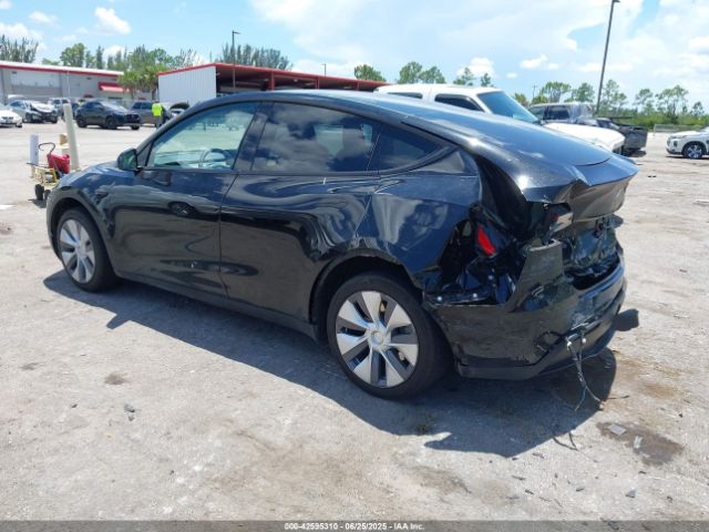 2023 TESLA MODEL Y 7SAYGAEE9PF931216 Photo 2