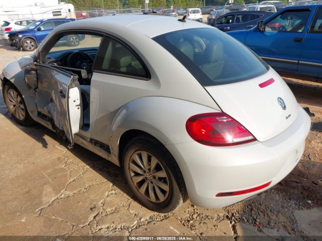 2017 VOLKSWAGEN BEETLE 3VWF17AT7HM624005 Photo 2