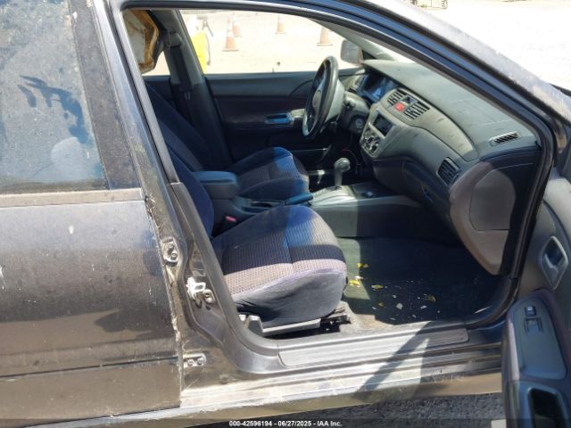 2004 MITSUBISHI LANCER JA3AJ66F14U045123 Photo 4
