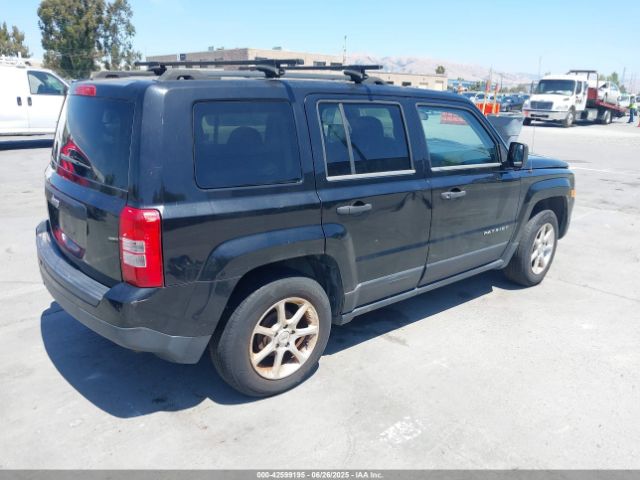 1C4NJPBBXED511001 Jeep Patriot
