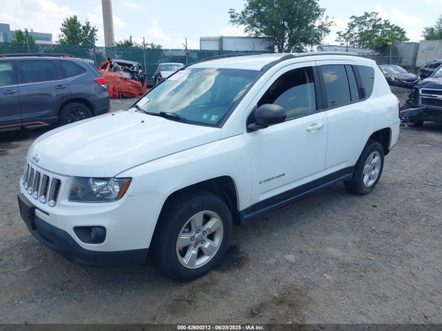 1C4NJCBA8FD334143 Jeep 2015