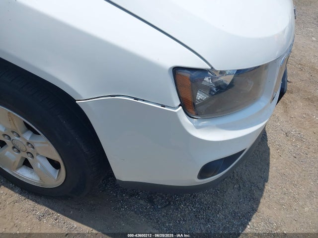 1C4NJCBA8FD334143 Jeep 2015