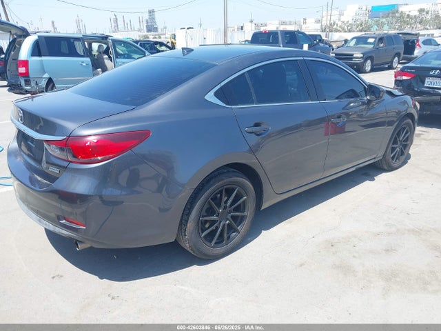 JM1GJ1V51G1478910 Mazda py