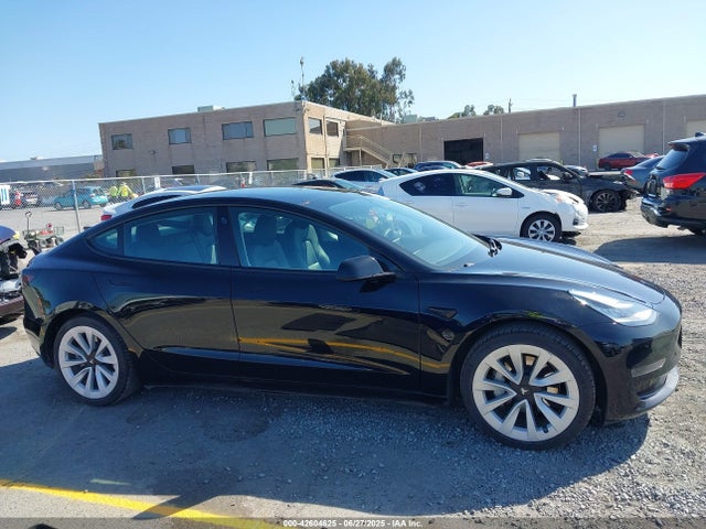 5YJ3E1EA0MF861210 Tesla 2021