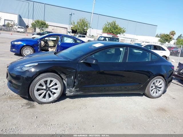 5YJ3E1EA0MF861210 Tesla 2021