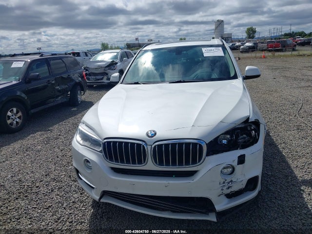 5UXKR0C54E0H18293 BMW 2014