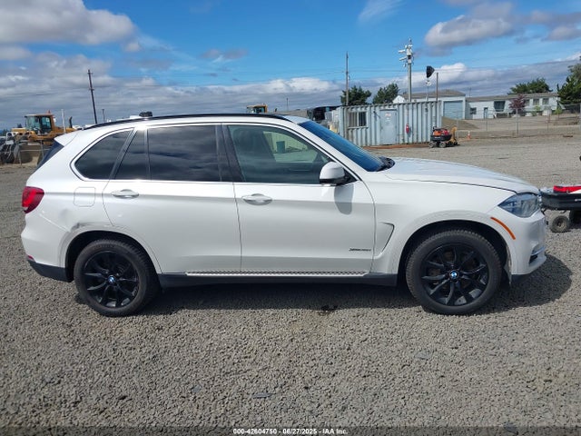 5UXKR0C54E0H18293 BMW 2014