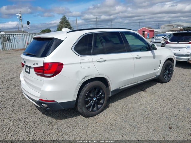 5UXKR0C54E0H18293 BMW 2014