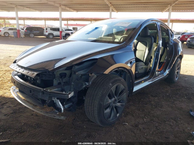 2024 TESLA MODEL Y 7SAYGDED0RF185220 Photo 1