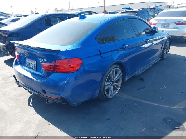 BMW 2015 2015 WBA4B1C52FD954885 Image 4
