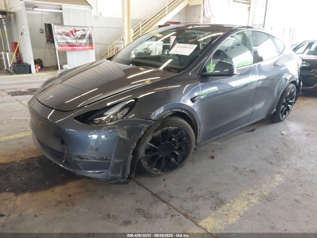 2023 TESLA MODEL Y 7SAYGDEE6PA116650 Photo 1