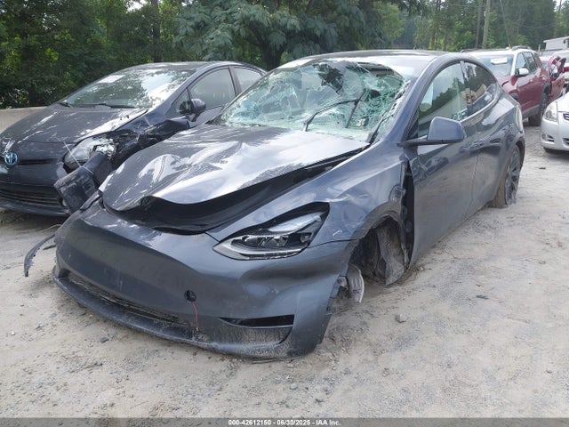2023 TESLA MODEL Y 7SAYGDEE4PF900876 Photo 1