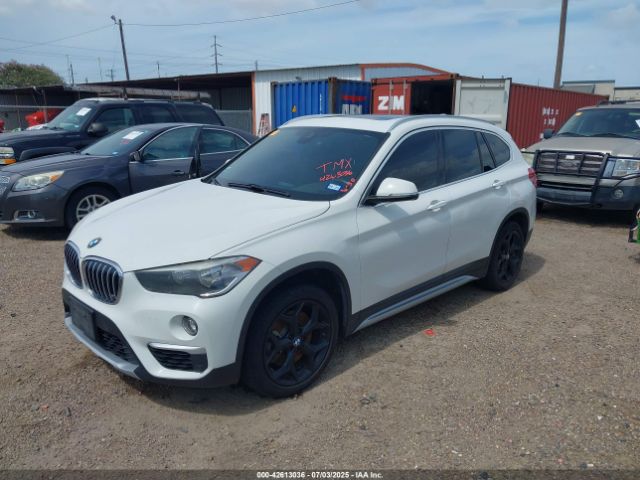 2019 BMW X1 WBXHU7C54K5L10880 Photo 1