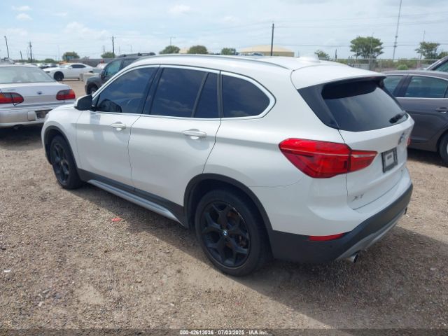 2019 BMW X1 WBXHU7C54K5L10880 Photo 2