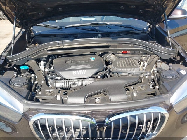 WBXHU7C35J3H43555 BMW X1