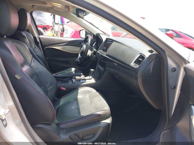 JM1GJ1W56E1109990 Mazda py