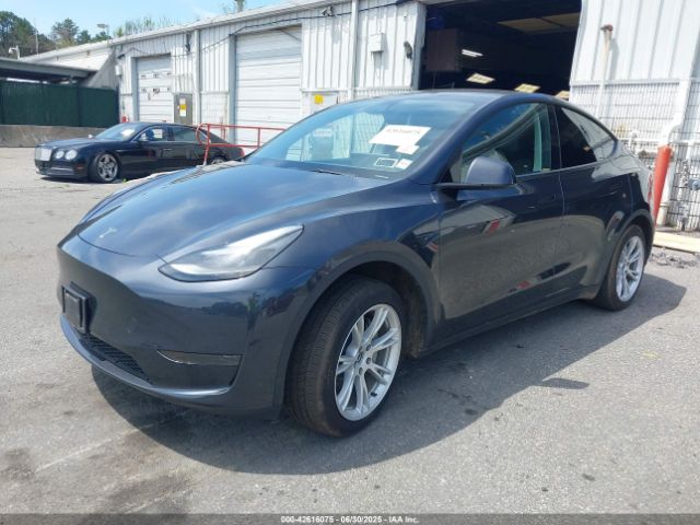2024 TESLA MODEL Y 7SAYGDED0RF033356 Photo 1