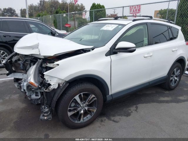 2016 TOYOTA RAV4 JTMWFREV2GJ092895 Photo 1