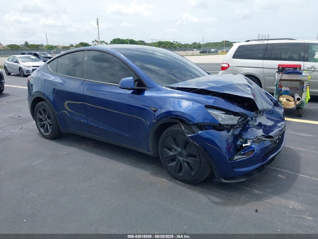 2024 TESLA MODEL Y 7SAYGDEE0RA312716 Photo 0