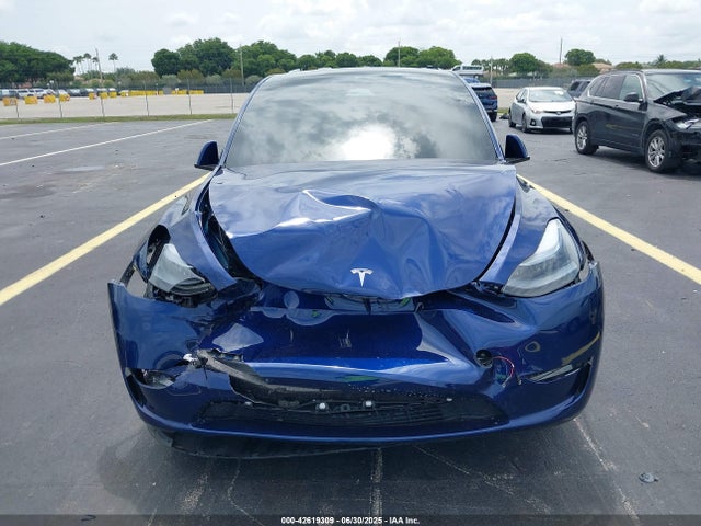 Tesla Model Y 2024 7SAYGDEE0RA312716 Image 12